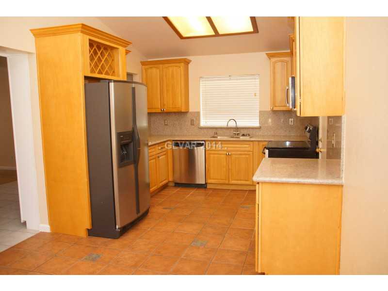 2805 Mirage Road Henderson, NV 89074 - Photo 10 of 34 Kitchen. Granite counter tops and stainless steel appliances in the kitchen.