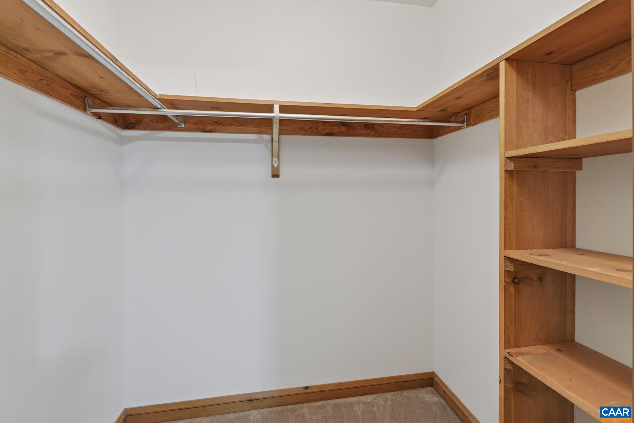 9 Timberlake Terrace Palmyra, VA 22963 - Photo 21 of 35 a view of walk in closet with empty racks