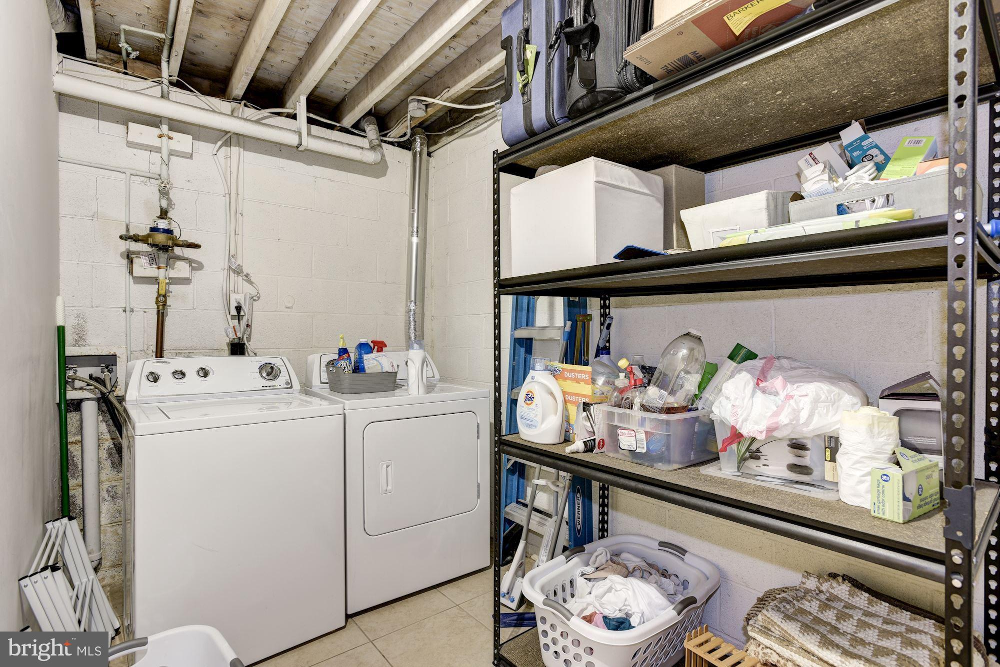 2454 Cloudcroft Square Reston, VA 20191 - Photo 19 of 29 Lwr Lvl laundry room-Perfect for storage!