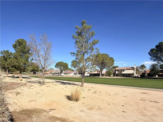 a view of a backyard of a house