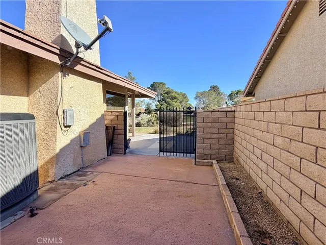 a view of a swimming pool with a lounge chairs