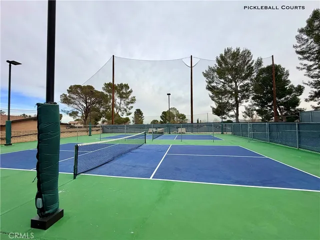 a view of backyard with outdoor seating
