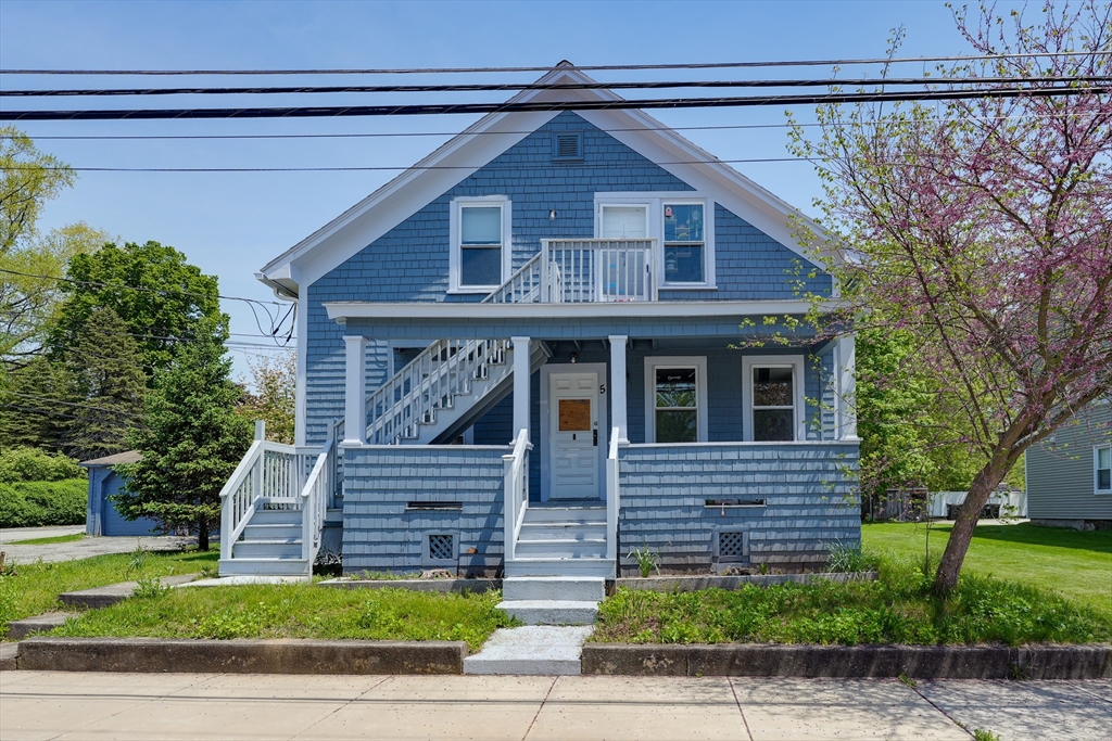 5 Eddy Street, Unit 2 Webster, MA 01570 - Photo 1 of 18 a front view of a house with garden