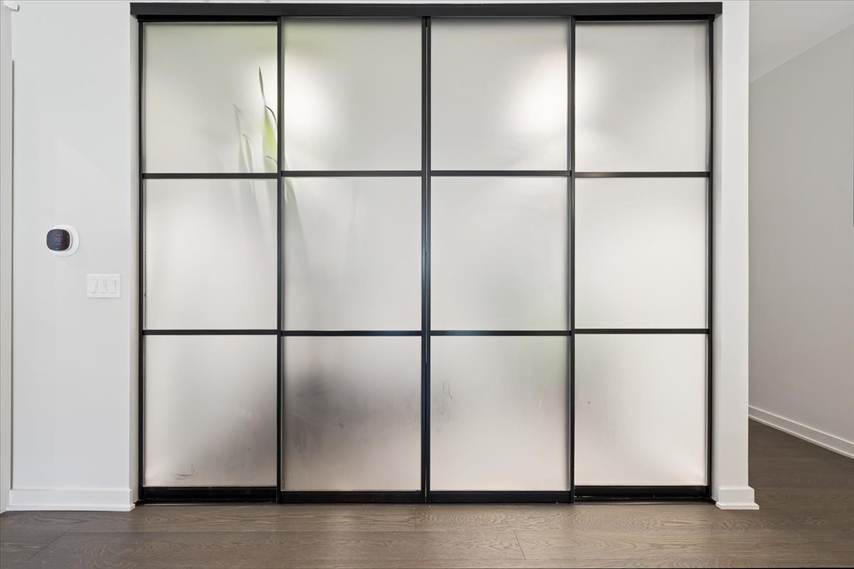 1648 West Division Street, Unit 208 Chicago, IL 60622 - Photo 11 of 48 a view of a refrigerator with a door