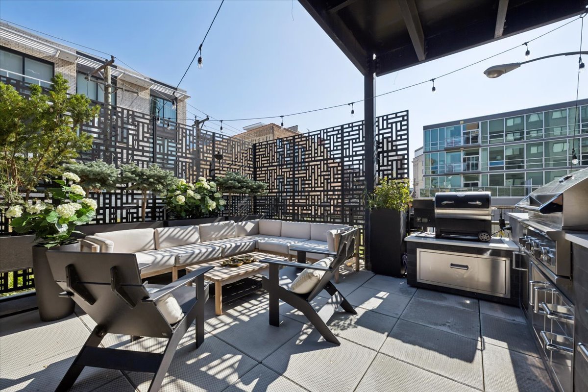 1648 West Division Street, Unit 208 Chicago, IL 60622 - Photo 19 of 48 a view of dinning table and chairs in the balcony