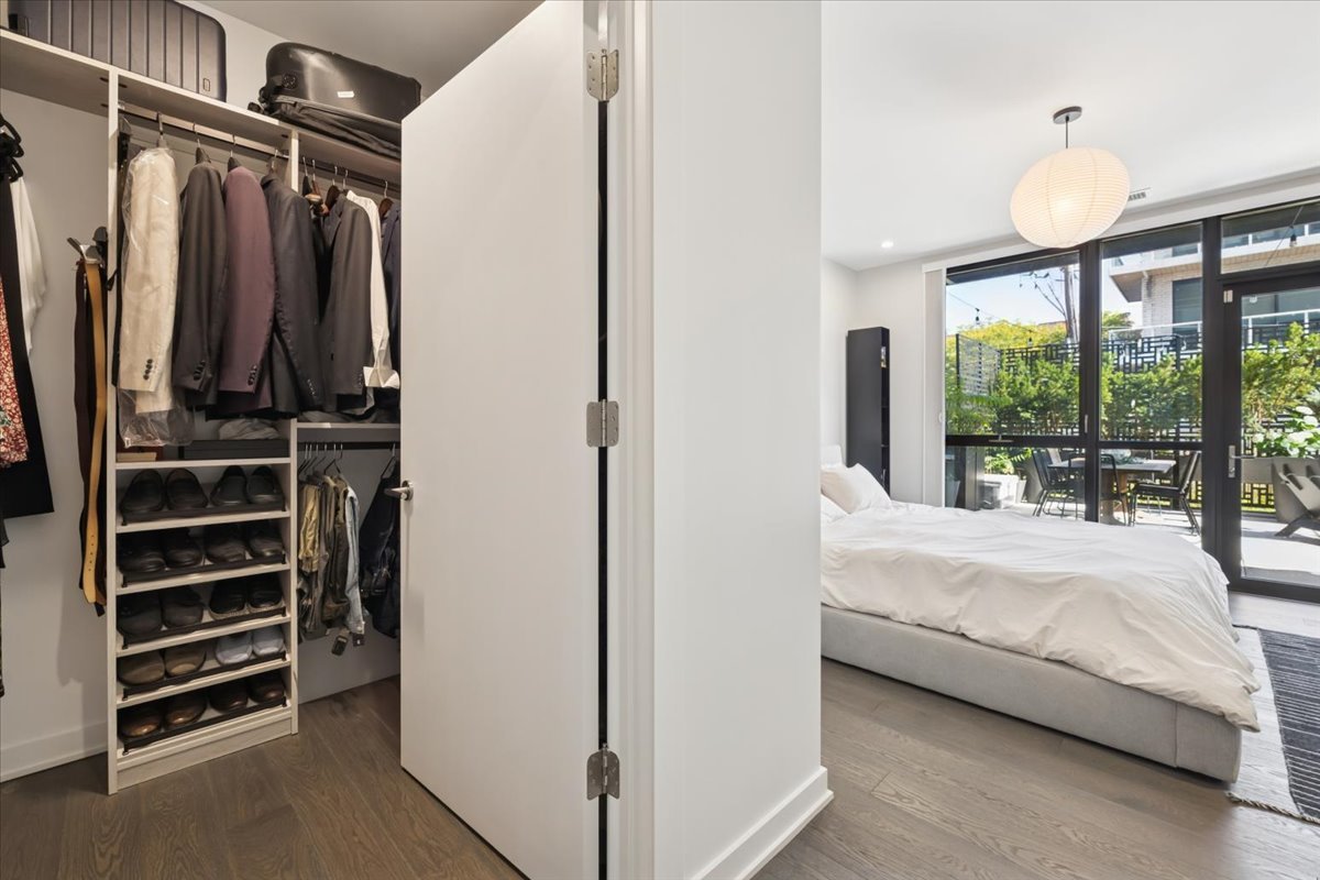 1648 West Division Street, Unit 208 Chicago, IL 60622 - Photo 30 of 48 a bedroom with a bed and a window