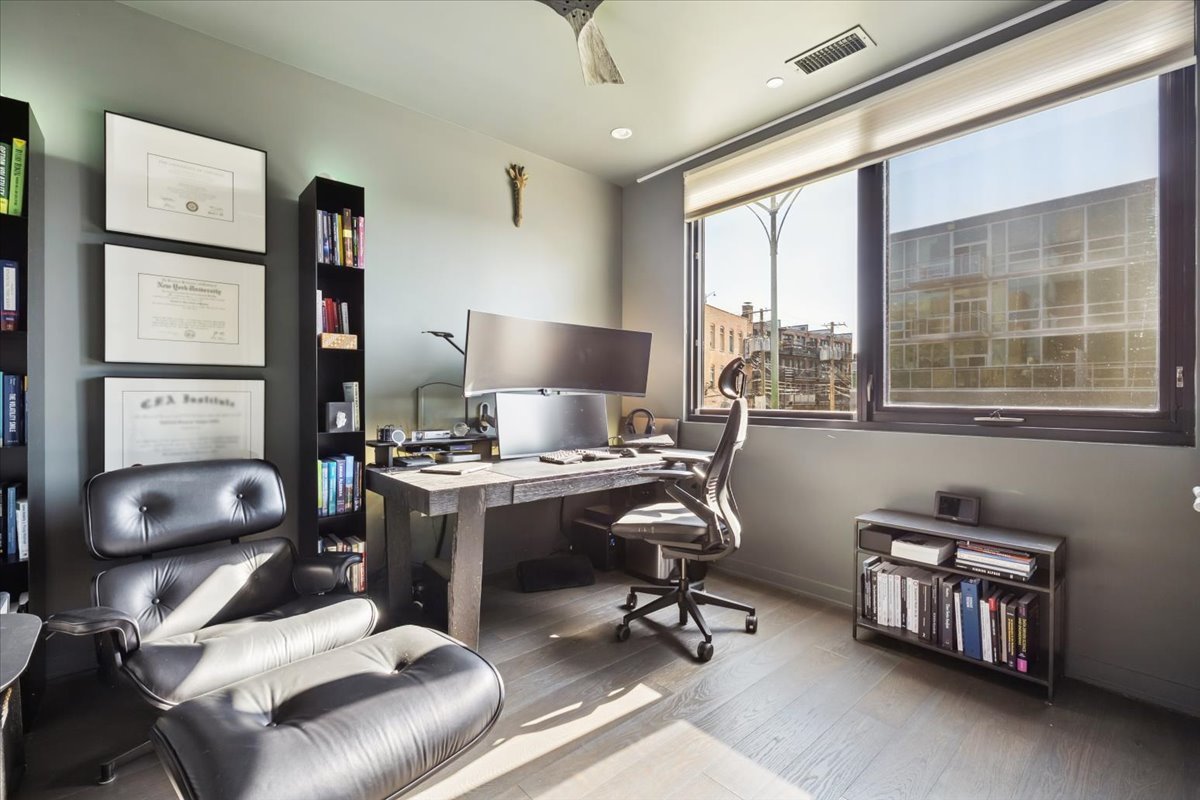 1648 West Division Street, Unit 208 Chicago, IL 60622 - Photo 32 of 48 a view of a workspace with furniture and a window