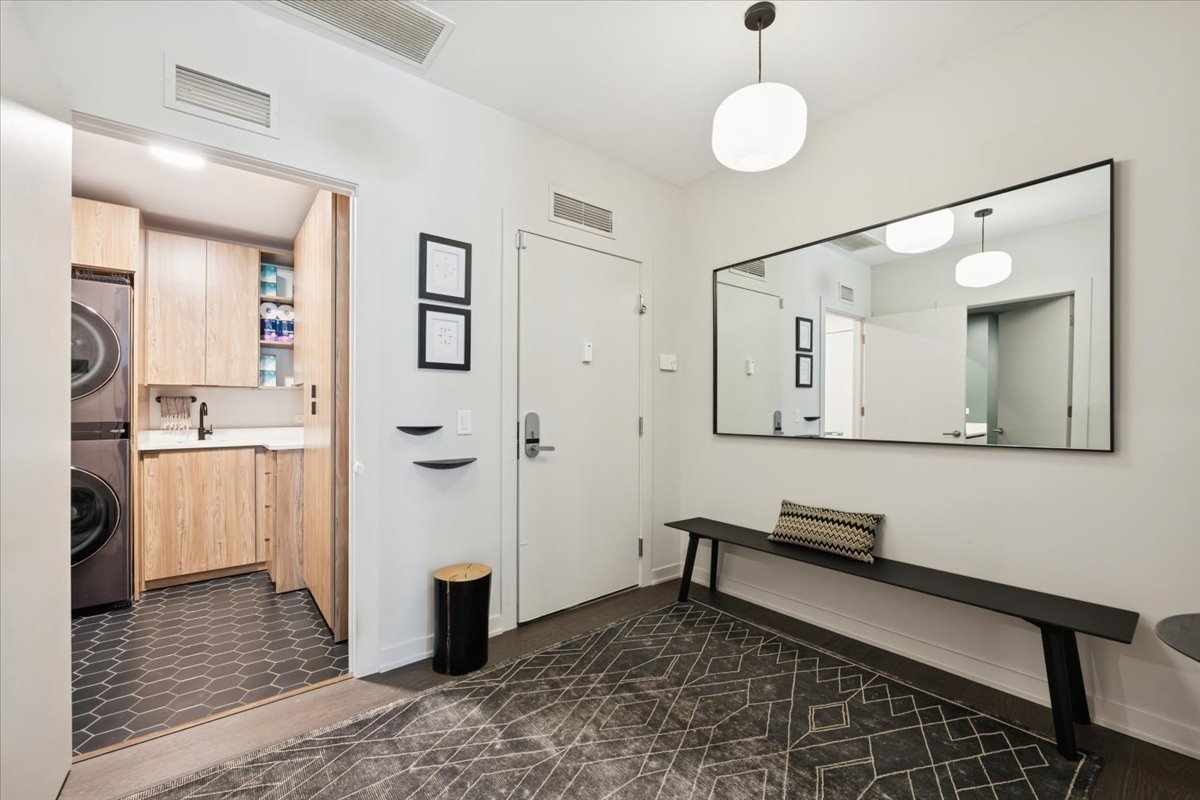 1648 West Division Street, Unit 208 Chicago, IL 60622 - Photo 37 of 48 a bathroom with a sink and a mirror