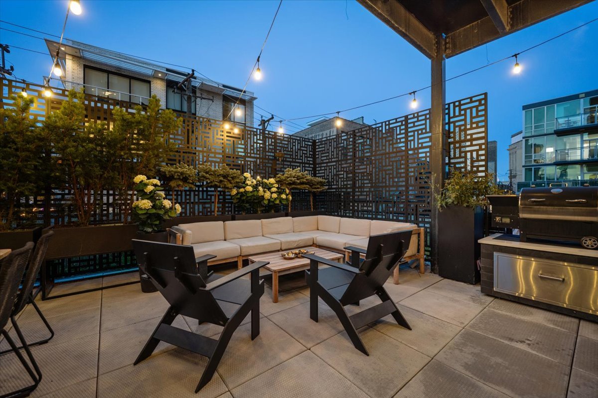 1648 West Division Street, Unit 208 Chicago, IL 60622 - Photo 42 of 48 a view of a patio with a table and chairs