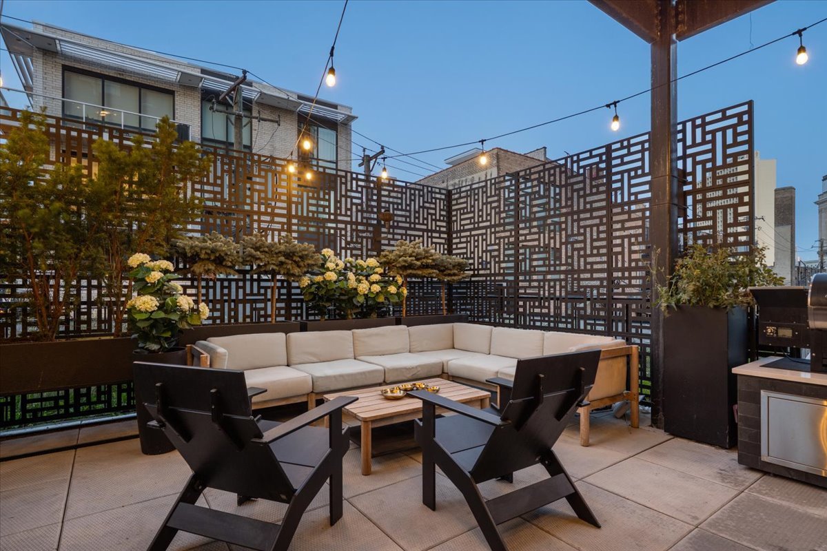 1648 West Division Street, Unit 208 Chicago, IL 60622 - Photo 43 of 48 a building outdoor space with patio furniture