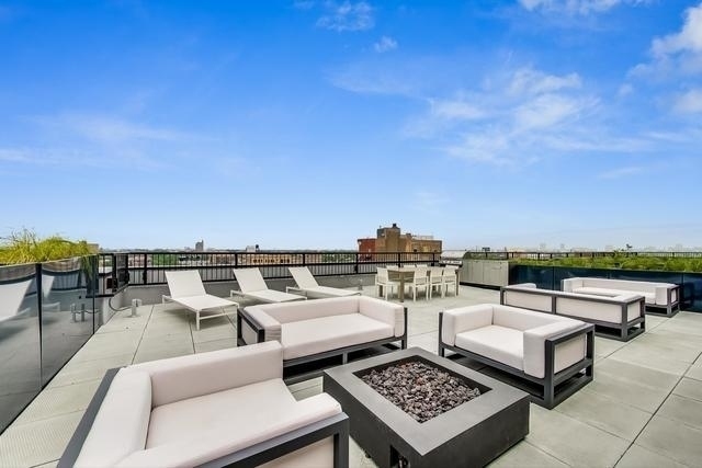 1648 West Division Street, Unit 208 Chicago, IL 60622 - Photo 48 of 48 a view of a terrace with furniture