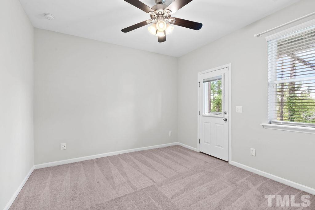 2223 Chattering Lory Lane Apex, NC 27502 - Photo 9 of 49 a view of an empty room with a window