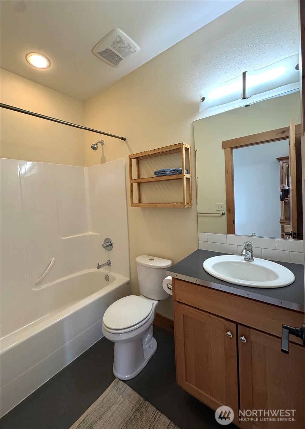 108 Jackrabbit Lane Chelan, WA 98816 - Photo 33 of 40 a bathroom with a sink a toilet and shower