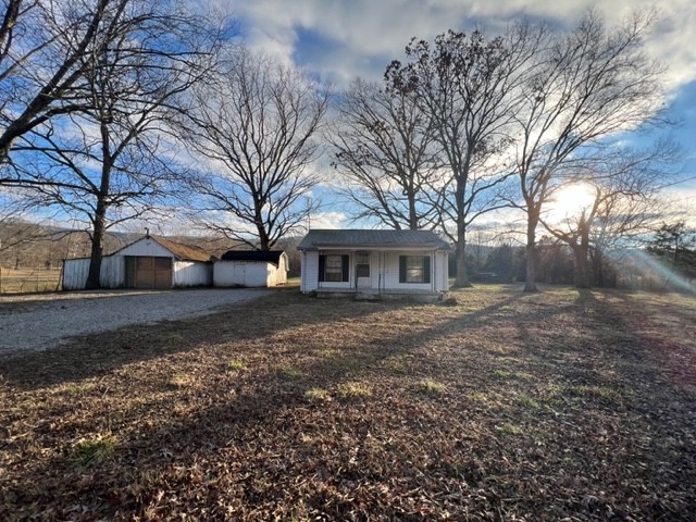 688 Spur Road Decherd, TN 37324 - Photo 2 of 15 a view of a house with a yard