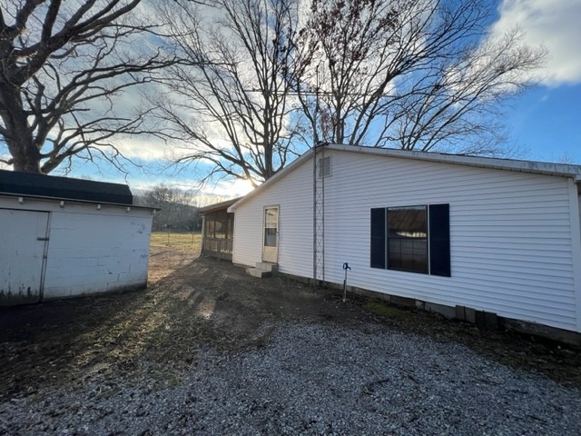 688 Spur Road Decherd, TN 37324 - Photo 4 of 15 a view of a house with a yard