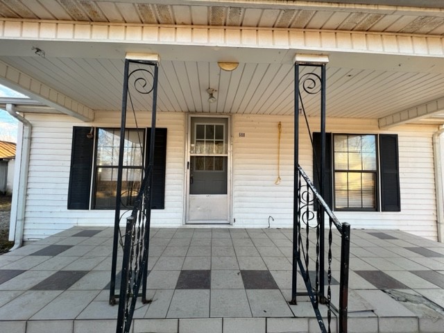 688 Spur Road Decherd, TN 37324 - Photo 5 of 15 a front view of a building with entryway