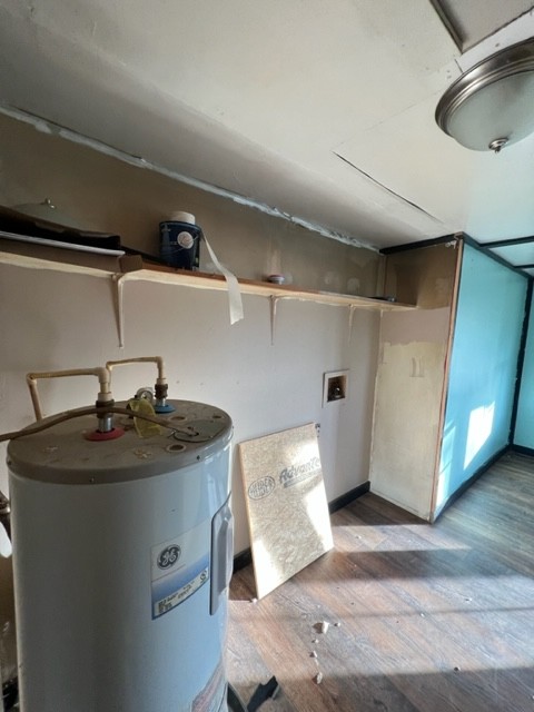 688 Spur Road Decherd, TN 37324 - Photo 9 of 15 a kitchen with a sink and a refrigerator