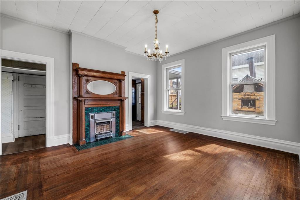 1630 State Avenue Coraopolis, PA 15108 - Photo 13 of 47 a view of an empty room with window fireplace and a window