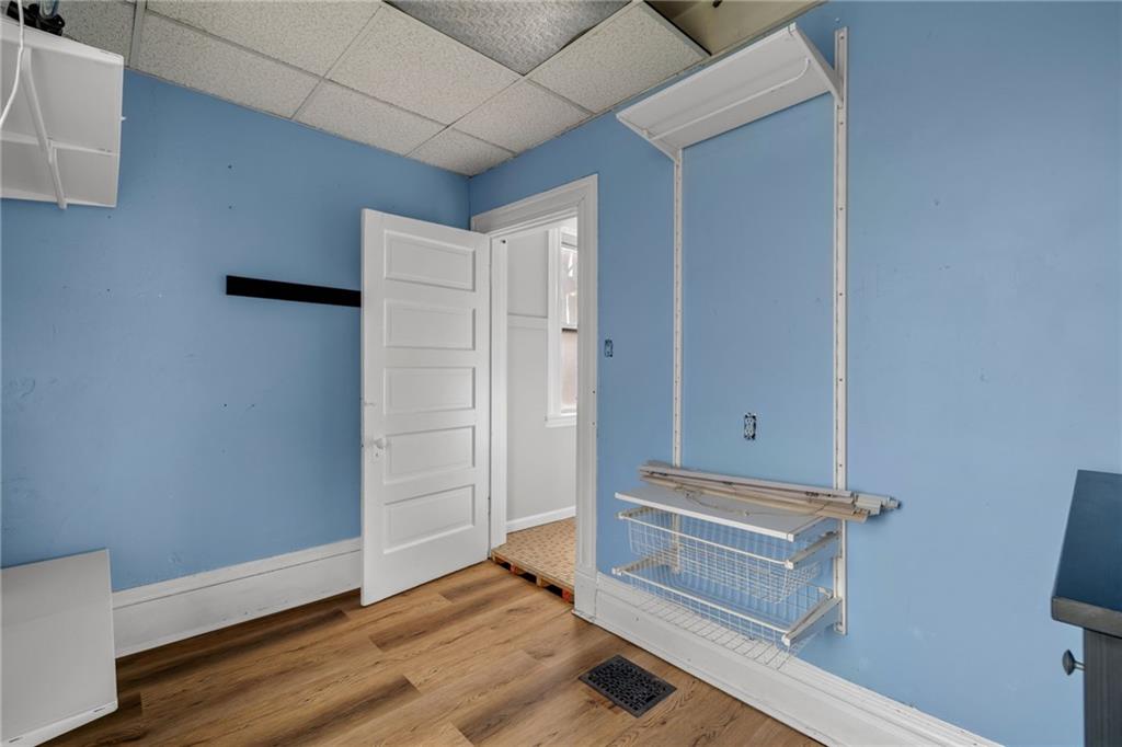 1630 State Avenue Coraopolis, PA 15108 - Photo 24 of 47 a view of room with hardwood floor and cabinet