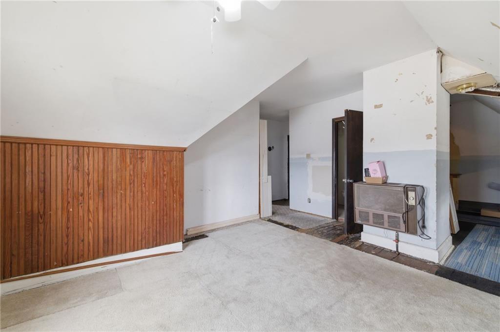 1630 State Avenue Coraopolis, PA 15108 - Photo 33 of 47 an empty room with a flat screen tv and a window