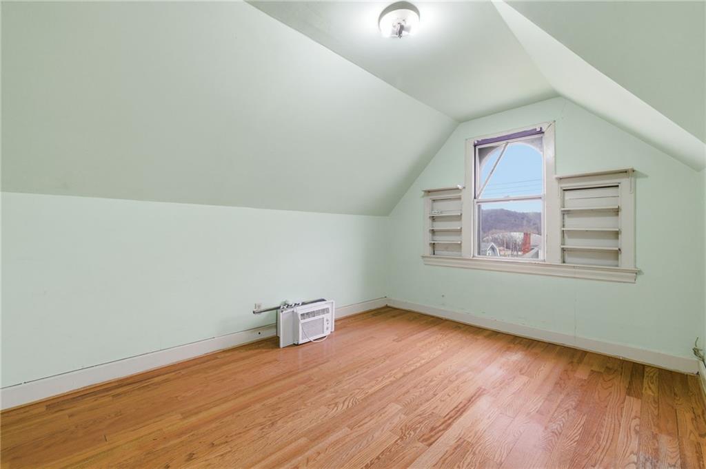 1630 State Avenue Coraopolis, PA 15108 - Photo 34 of 47 an empty room with wooden floor and windows