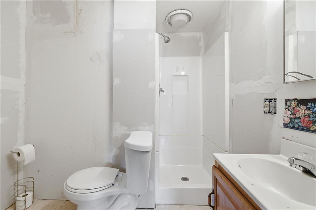 1630 State Avenue Coraopolis, PA 15108 - Photo 38 of 47 a bathroom with a sink a toilet and shower