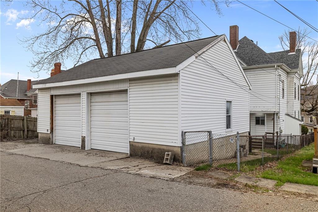 1630 State Avenue Coraopolis, PA 15108 - Photo 44 of 47 a view of a house with a yard and garage