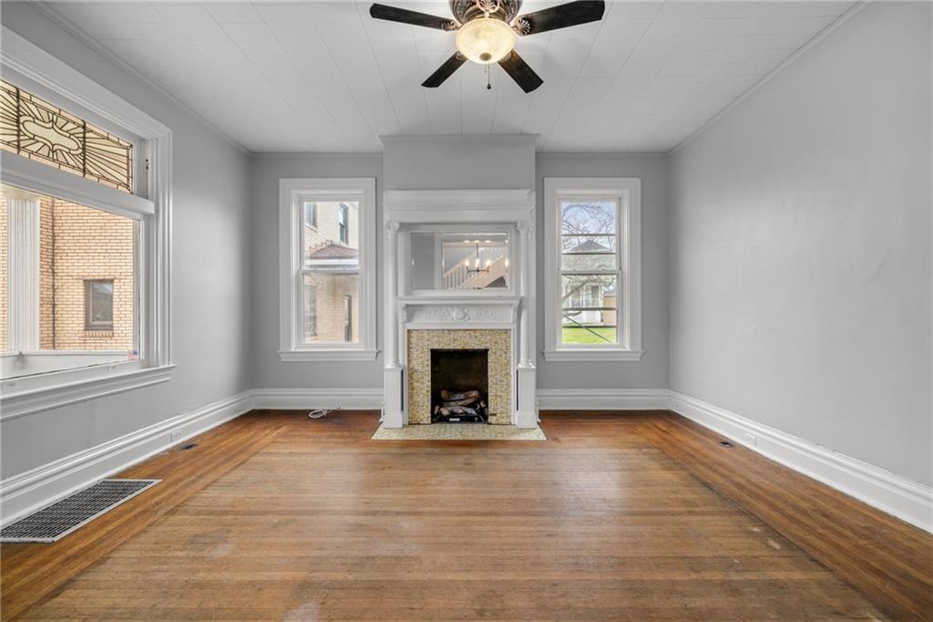 1630 State Avenue Coraopolis, PA 15108 - Photo 9 of 47 a view of an empty room with window and fire place