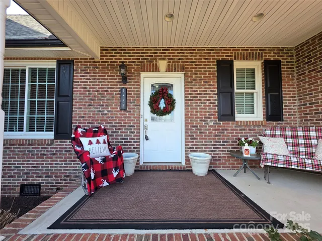 a backyard of a house with seating space