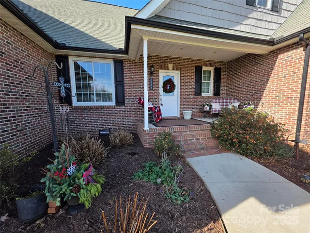 a front view of a house with a porch