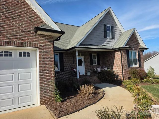 a front view of a house with a porch