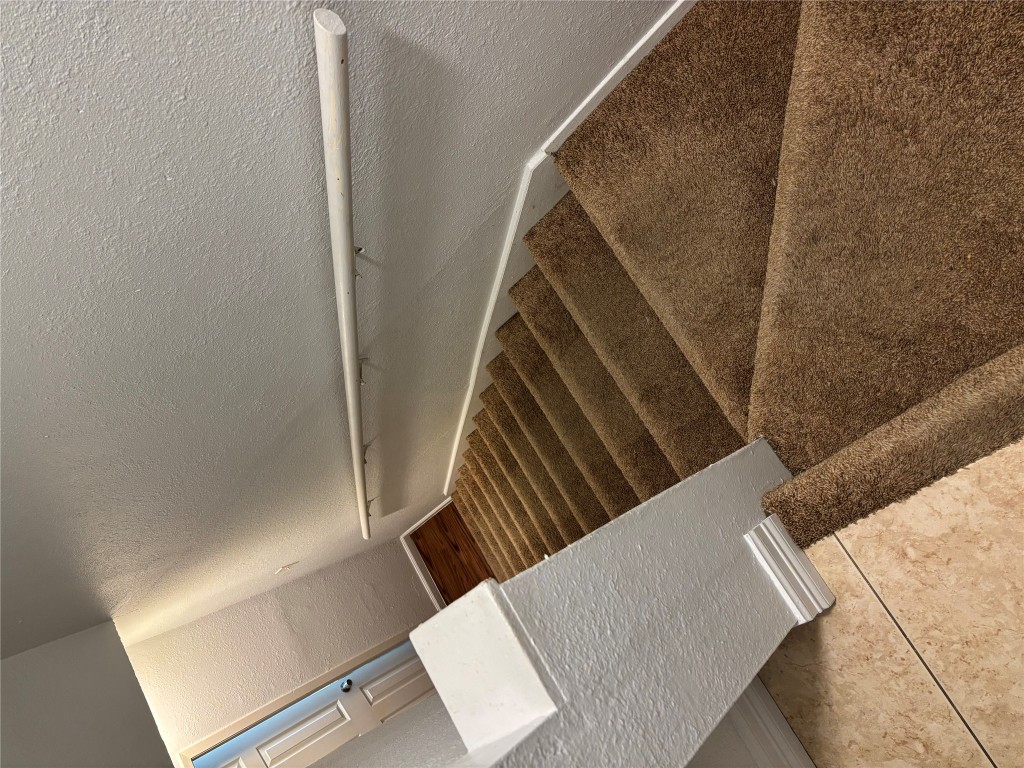1210 Southport Drive, Unit B Austin, TX 78704 - Photo 11 of 14 a view of staircase and utility room with stairs