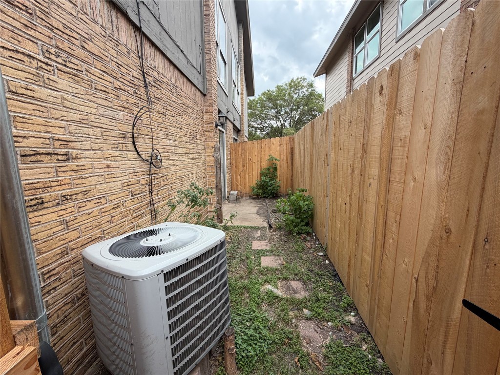 1210 Southport Drive, Unit B Austin, TX 78704 - Photo 14 of 14 a bathroom with a sink and a mirror