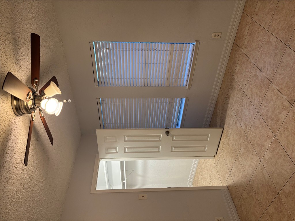 1210 Southport Drive, Unit B Austin, TX 78704 - Photo 9 of 14 a view of an empty room with a window