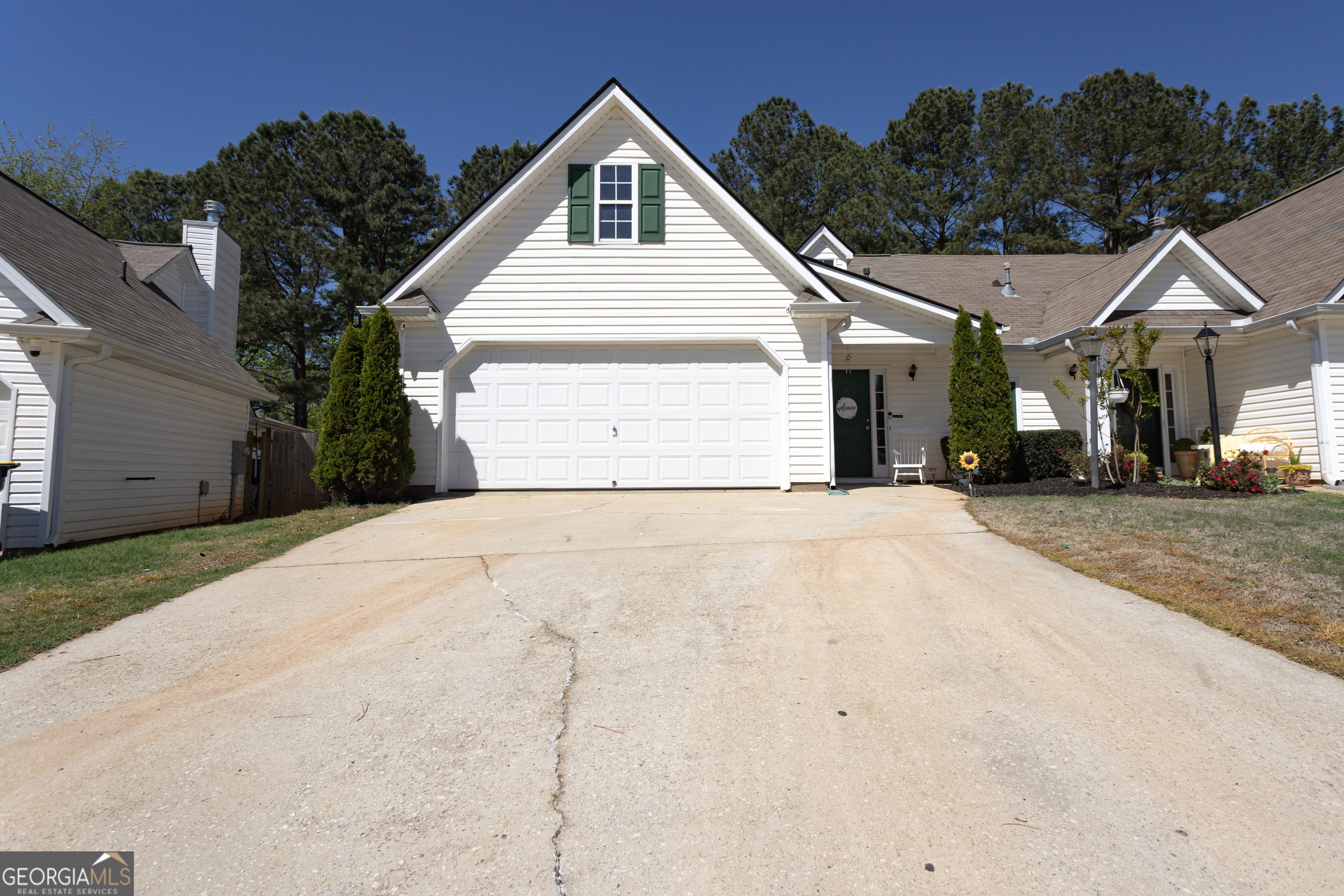 175 Courtyard Lane Newnan, GA 30265 - Photo 1 of 1 a view of garage and yard