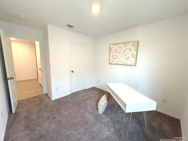 a bathroom with a toilet a sink and a bathtub