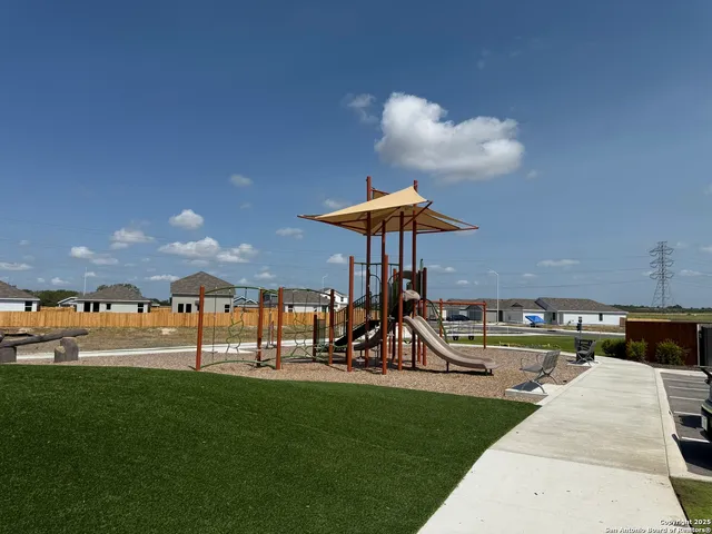 a house view with a backyard space