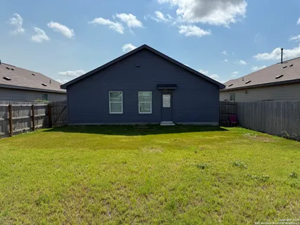 a view of a garden with patio