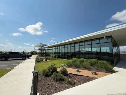 a front view of a building with street view
