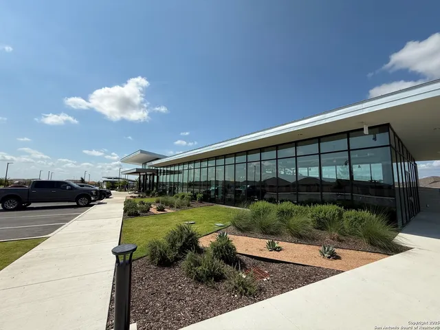 a front view of a building with street view