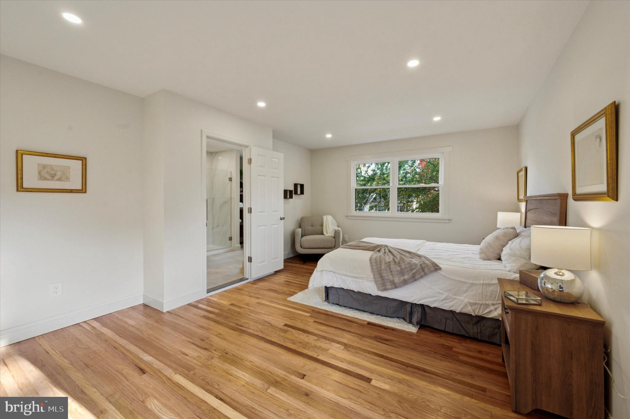 210 David Drive Havertown, PA 19083 - Photo 23 of 38 a bedroom with a large bed and wooden floor