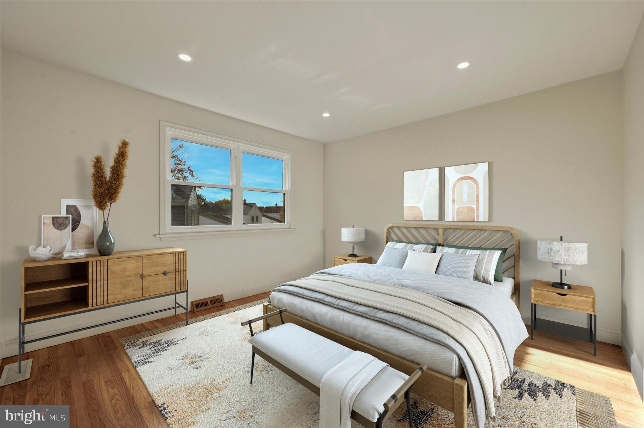 210 David Drive Havertown, PA 19083 - Photo 27 of 38 a bedroom with a bed and wooden floor