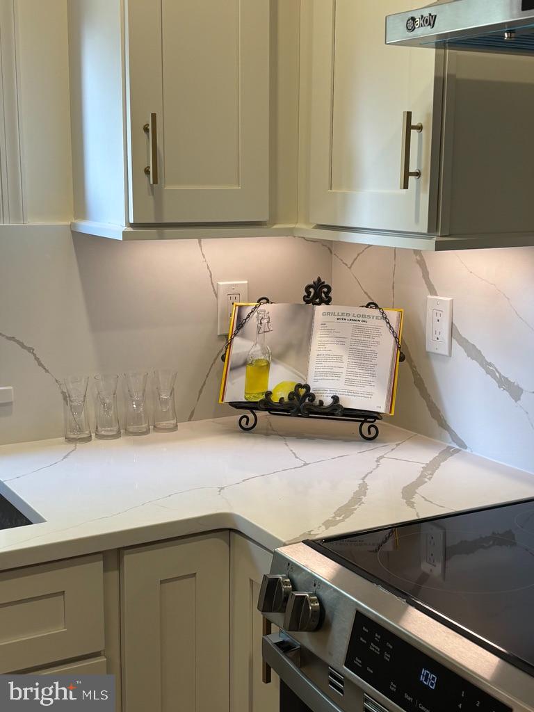 210 David Drive Havertown, PA 19083 - Photo 32 of 38 a bathroom with a sink and a mirror