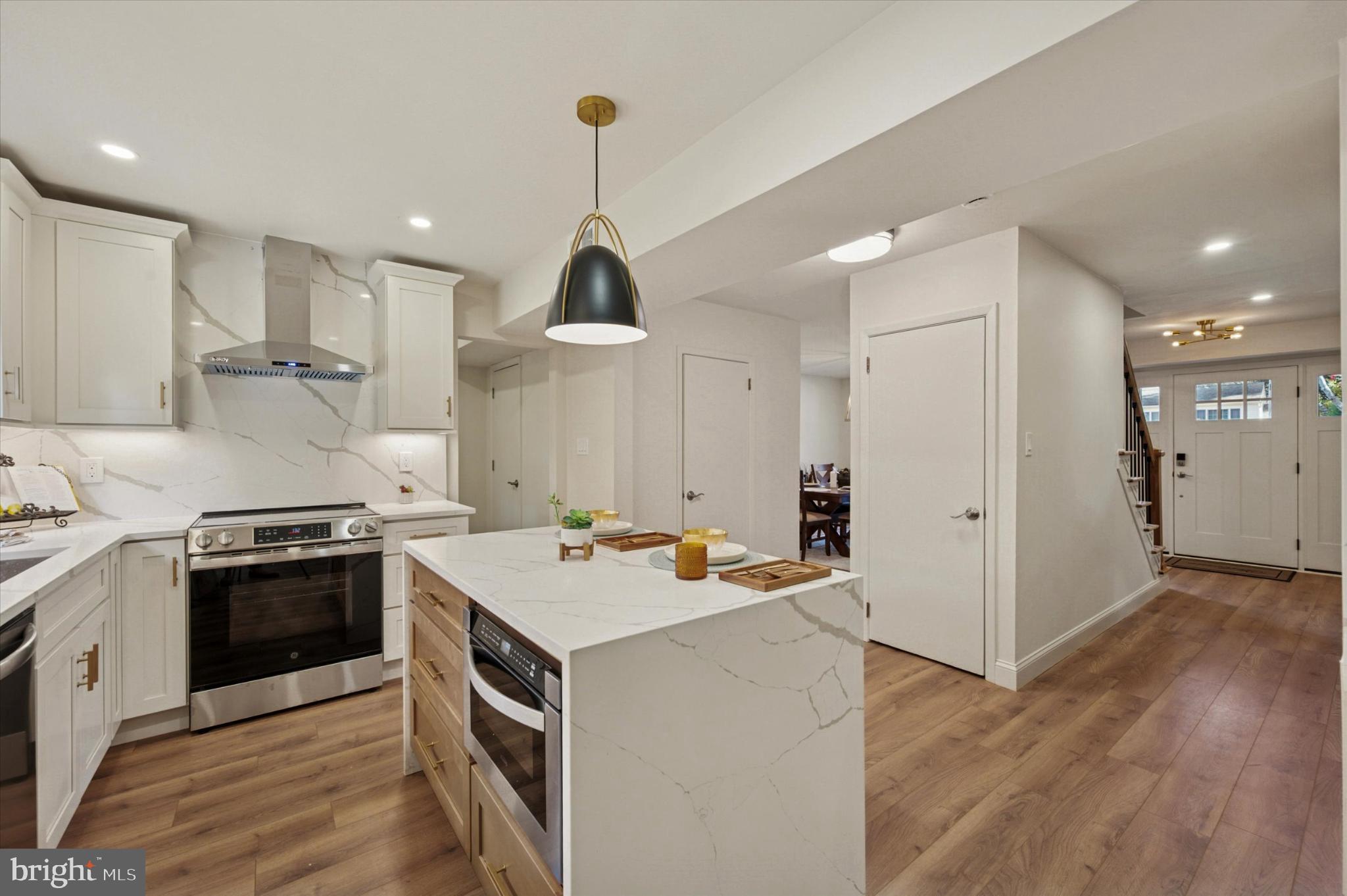210 David Drive Havertown, PA 19083 - Photo 7 of 38 a kitchen with stainless steel appliances granite countertop a stove and a sink