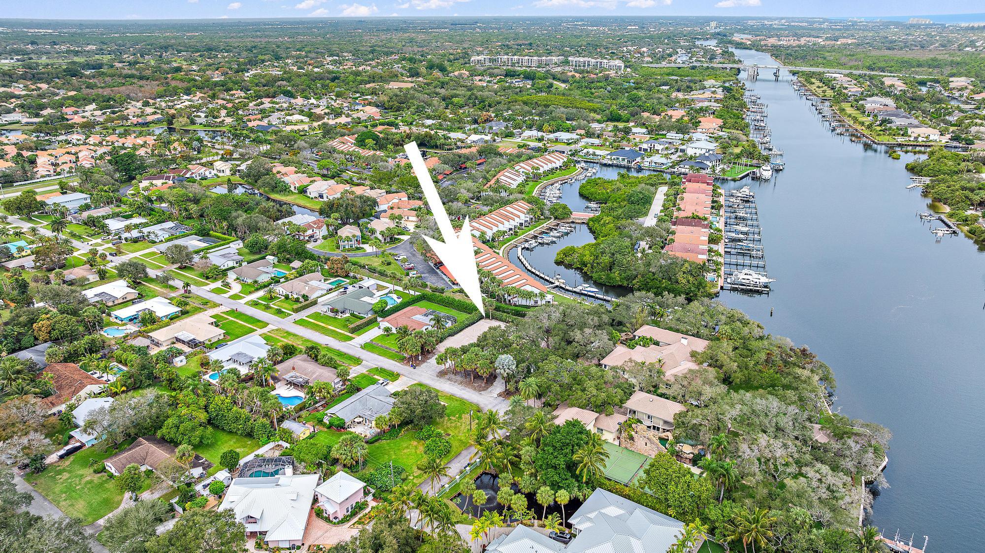 2267 Windsor Road Palm Beach Gardens, FL 33410 - Photo 14 of 17 a view of a city with mountains in the background
