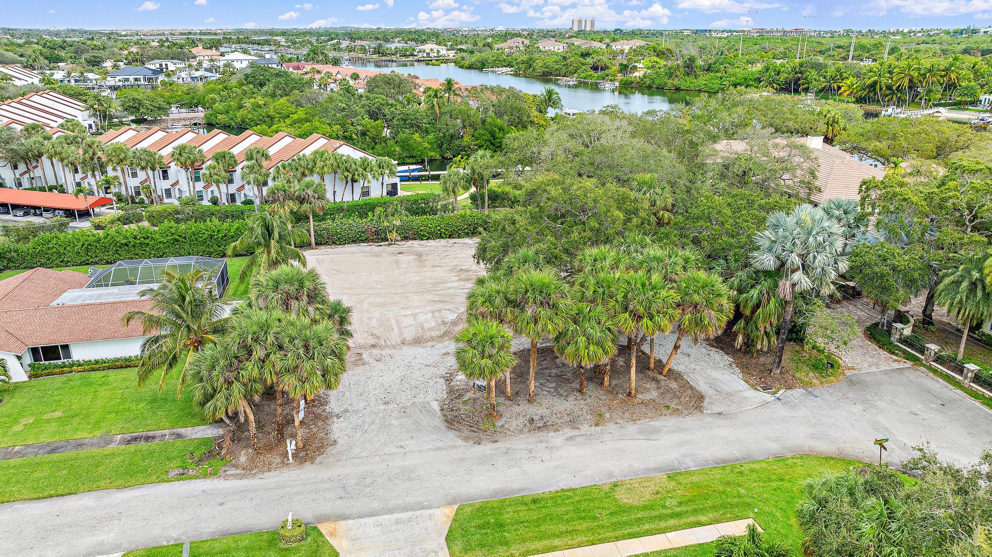 2267 Windsor Road Palm Beach Gardens, FL 33410 - Photo 17 of 17 a view of a street with a houses
