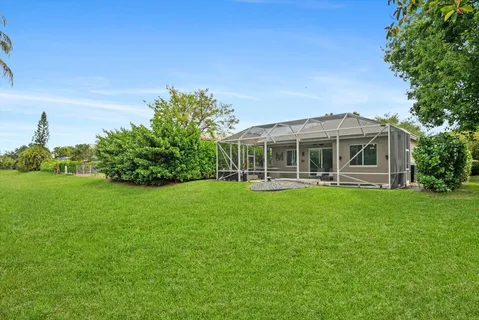 an aerial view of a house with a garden