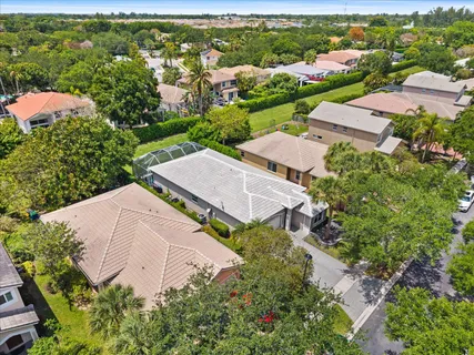 an aerial view of a house with a garden