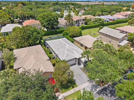 an aerial view of a house with a garden