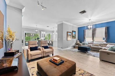 a living room with furniture and a couch